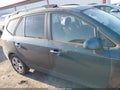 2009 Kia Rondo — photo 13 of 17 | VIN KNAFG526997253436