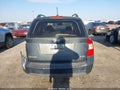 2009 Kia Rondo — photo 16 of 17 | VIN KNAFG526997253436