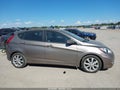 2013 Hyundai Accent — photo 13 of 16 | VIN KMHCU5AE4DU075447