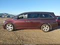 2012 Honda Odyssey — photo 14 of 16 | VIN 5FNRL5H99CB019375