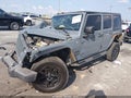 2014 Jeep Wrangler Unlimited — photo 2 of 15 | VIN 1C4BJWDG9EL149657