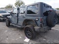 2014 Jeep Wrangler Unlimited — photo 3 of 15 | VIN 1C4BJWDG9EL149657