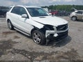 2014 Mercedes-Benz ML-Class — photo 1 of 18 | VIN 4JGDA5HB6EA305064