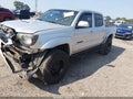 2012 Toyota Tacoma — photo 2 of 17 | VIN 5TFLU4EN9CX038366