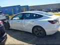 2021 Tesla Model 3 — photo 14 of 16 | VIN 5YJ3E1EA2MF029724