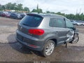 2014 Volkswagen Tiguan — photo 4 of 15 | VIN WVGAV3AX6EW592801