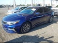 2019 Kia Optima — photo 2 of 17 | VIN 5XXGU4L13KG304651