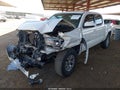 2016 Toyota Tacoma — photo 2 of 16 | VIN 3TMAZ5CN7GM004844