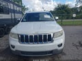 2013 Jeep Grand Cherokee — photo 12 of 16 | VIN 1C4RJEBT1DC637024