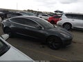 2018 Tesla Model 3 — photo 12 of 15 | VIN 5YJ3E1EA2JF018900