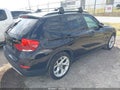2013 BMW X1 — photo 4 of 13 | VIN WBAVM1C50DVW46068