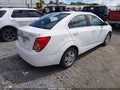 2015 Chevrolet Sonic — photo 4 of 11 | VIN 1G1JC5SH1F4177727