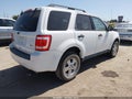 2012 Ford Escape — photo 4 of 11 | VIN 1FMCU0D74CKB07517