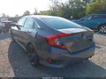 2019 Honda Civic — photo 3 of 11 | VIN 19XFC2E80KE014731