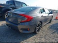 2019 Honda Civic — photo 4 of 11 | VIN 19XFC2E80KE014731