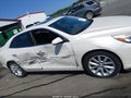 2014 Chevrolet Malibu — photo 13 of 16 | VIN 1G11H5SLXEF167934