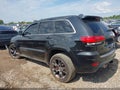 2014 Jeep Grand Cherokee — photo 14 of 16 | VIN 1C4RJFDJ8EC226903