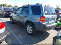 2006 Ford Escape — photo 3 of 17 | VIN 1FMYU93106KB08191