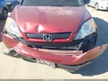2009 Honda CR-V — photo 6 of 11 | VIN 5J6RE38319L020367