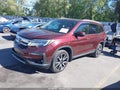 2020 Honda Pilot — photo 2 of 16 | VIN 5FNYF6H95LB028745