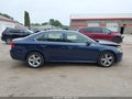 2014 Volkswagen Passat — photo 13 of 16 | VIN 1VWBP7A32EC005922