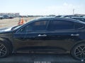 2019 Kia Optima — photo 15 of 17 | VIN 5XXGW4L23KG323333