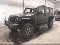 2013 Jeep Wrangler Unlimited — photo 2 of 17 | VIN 1C4BJWDG5DL632562
