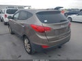 2010 Hyundai Tucson — photo 3 of 17 | VIN KM8JU3AC3AU074473