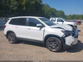 2023 Honda Passport — photo 13 of 16 | VIN 5FNYF8H53PB010260