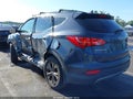 2014 Hyundai Santa Fe — photo 3 of 16 | VIN 5XYZU3LB6EG229018