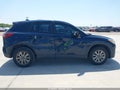 2015 Mazda CX-5 — photo 13 of 16 | VIN JM3KE2BE9F0464368