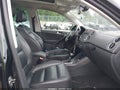 2010 Volkswagen Tiguan — photo 5 of 12 | VIN WVGBV7AX1AW516604