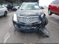 2014 Cadillac SRX — photo 13 of 18 | VIN 3GYFNFE3XES647498