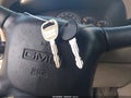 2002 GMC Yukon XL — photo 11 of 14 | VIN 3GKFK16Z42G207056