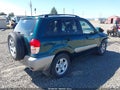 2003 Toyota RAV4 — photo 4 of 22 | VIN JTEGH20V930097715