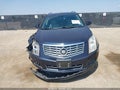 2014 Cadillac SRX — photo 12 of 16 | VIN 3GYFNBE36ES561159