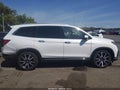 2020 Honda Pilot — photo 13 of 16 | VIN 5FNYF6H08LB033407