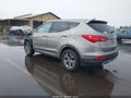 2015 Hyundai Santa Fe — photo 3 of 19 | VIN 5XYZTDLB0FG238176