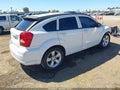 2011 Dodge Caliber — photo 4 of 12 | VIN 1B3CB3HAXBD120004