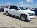 2015 Chevrolet Suburban 1500 — photo 1 of 15 | VIN 1GNSCJKC4FR608614