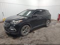 2017 Hyundai Santa Fe — photo 2 of 16 | VIN 5NMZUDLB5HH051442
