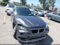 2015 BMW X1 — photo 14 of 18 | VIN WBAVM1C56FV319256