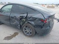 2024 Tesla Model Y — photo 6 of 19 | VIN 7SAYGDEE1RA334045