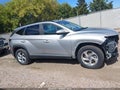 2022 Hyundai Tucson — photo 13 of 18 | VIN 5NMJBCAE1NH040508