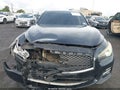 2015 Infiniti Q50 — photo 12 of 16 | VIN JN1BV7AR6FM401637