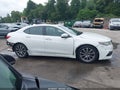 2015 Acura TLX — photo 14 of 22 | VIN 19UUB2F50FA023017