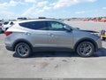 2018 Hyundai Santa Fe — photo 13 of 17 | VIN 5XYZUDLB3JG509611