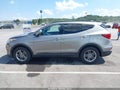 2018 Hyundai Santa Fe — photo 14 of 17 | VIN 5XYZUDLB3JG509611