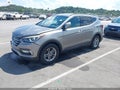 2018 Hyundai Santa Fe — photo 2 of 17 | VIN 5XYZUDLB3JG509611
