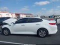 2016 Kia Optima — photo 16 of 18 | VIN KNAGT4L35G5101211